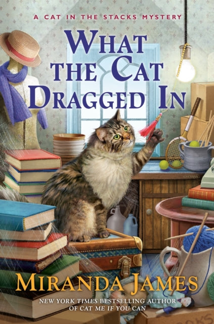 Book cover of: What the Cat Dragged In. By: Miranda James