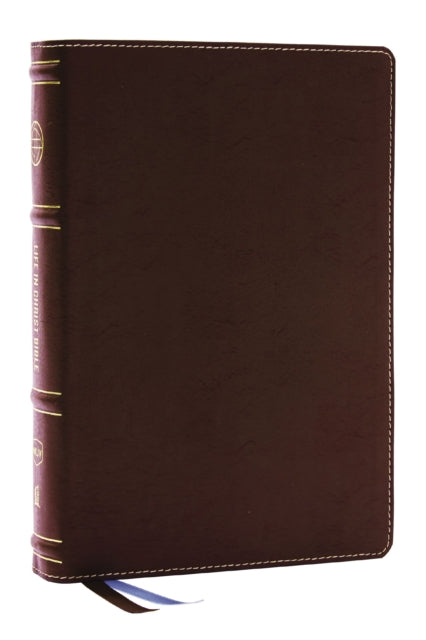 Book cover of: Life in Christ Bible: Discovering, Believing, and Rejoicing in Who God Says You Are  (NKJV, Brown Bonded Leather, Thumb Indexed, Red Letter, Comfort Print). By: Zondervan