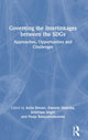Book cover of: Governing the Interlinkages between the SDGs. By: Anita Breuer