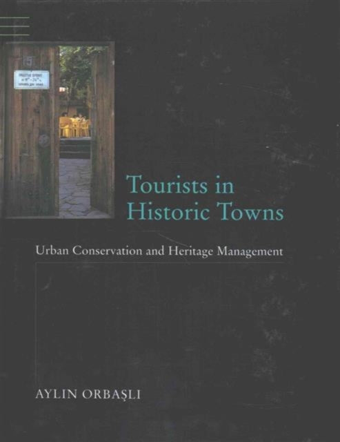 Book cover of: Tourists in Historic Towns. By: Aylin Orbasli