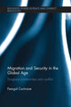 Book cover of: Migration and Security in the Global Age. By: Feargal Cochrane