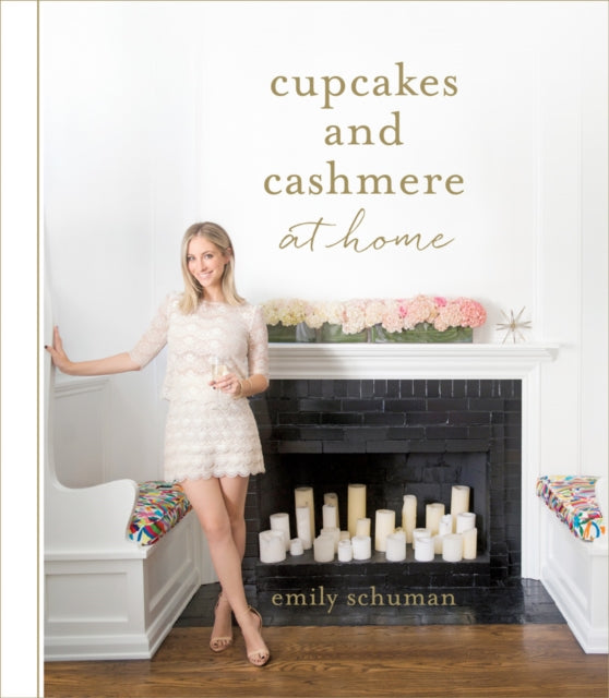 Book cover of: Cupcakes and Cashmere at Home. By: Emily Schuman