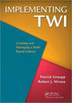 Book cover of: Implementing TWI. By: Patrick Graupp