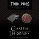 Book cover of: Game of Thrones Twin Pins: Stark and Targaryen Sigils. By: Chronicle Books Staff