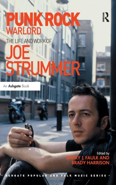 Book cover of: Punk Rock Warlord: the Life and Work of Joe Strummer. By: Brady Harrison