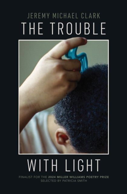 Book cover of: Trouble with Light. By: Jeremy Michael Clark