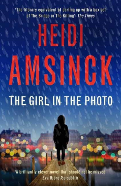 Book cover of: Girl in the Photo. By: Heidi Amsinck