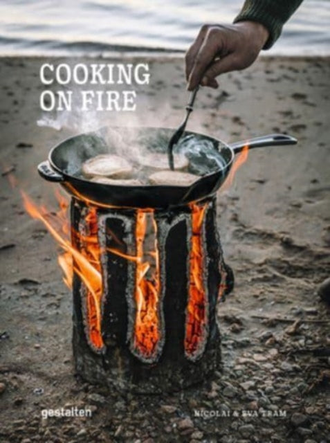 Book cover of: Cooking on Fire. By: Eva Helbæk Tram